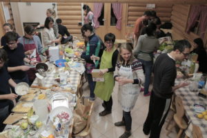 A bunch of happily busy cooks